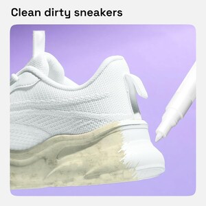 May include: A white sneaker with a mesh upper and a thick sole being painted with a white marker. The text 'Clean dirty sneakers' appears at the top. The marker is actively covering a discolored, stained section of the sole with fresh white paint.