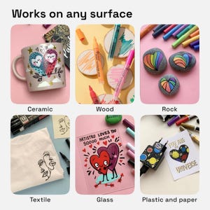 May include: Image showcasing various art projects on different surfaces, including ceramic mugs, wood coasters, rocks, textile, glass, and plastic. The text "Works on any surface" is at the top. Each surface features colorful artwork created with paint markers.