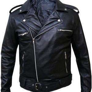 May include: A black motorcycle jacket featuring a wide notched lapel, an asymmetrical front zipper closure, and silver-toned metal hardware. The jacket includes two zippered chest pockets, two zippered waist pockets, shoulder epaulets, and a belt.