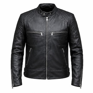 May include: A black leather jacket featuring a stand-up collar with a snap button closure, a full-length front zipper, and two horizontal zippered chest pockets. The shoulders have quilted diamond-patterned panels and zippered cuffs.