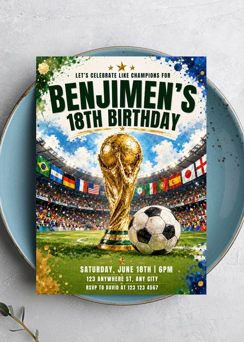 May include: A rectangular birthday invitation card featuring a gold trophy and a soccer ball on a green field inside a stadium. The text reads: LET'S CELEBRATE LIKE CHAMPIONS FOR BENJIMEN'S 18TH BIRTHDAY, SATURDAY, JUNE 18TH | 6PM, 123 ANYWHERE ST, ANY CITY, RSVP TO DAVID AT 123 123 4567.