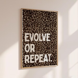 Evolve or Repeat Quote Wall Art, Bold White Typography on Brown Leopard Print Background, Motivational Maximalist Bedroom Decor, UNFRAMED