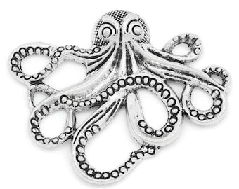 May include: Antique silver octopus charm with detailed tentacles and a textured head. The charm is a decorative piece, possibly for jewelry or crafts. The text "Antique Silver" is visible in the image.
