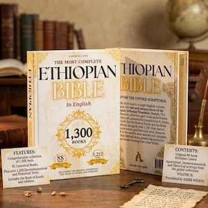 May include: Two-volume set of "The Most Complete Ethiopian Bible In English" by Asher Wilson. The books have gold lettering and decorative elements on the covers. Includes 1,300 texts, 81 canonical books, and over 1,200 Deuterocanonical and historical texts.