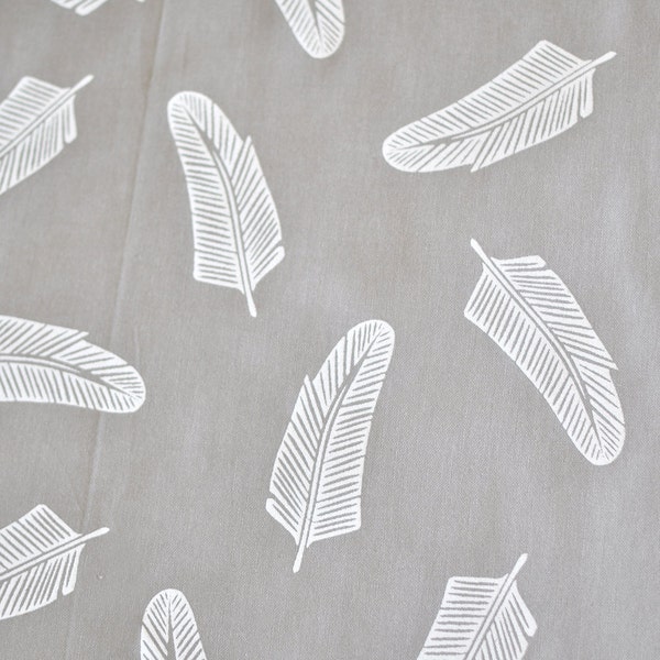 quill in alabaster on grey cotton handprinted fabric panel
