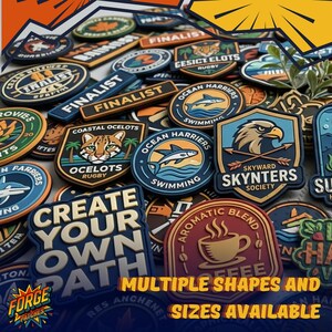 May include: A collection of various rubberised patches in diverse shapes and colours, featuring graphic designs like an eagle, a coffee cup, and an ocelot. Text includes 'CREATE YOUR OWN PATH', 'SKYWARD SKYNTERS SOCIETY', and 'OCEAN HARRIERS SWIMMING'.