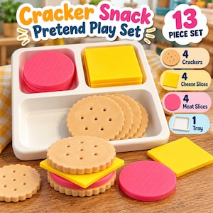 May include: A 13-piece pretend play set featuring a white plastic tray, four tan round crackers with dotted patterns, four yellow square cheese slices, and four pink round meat slices. The set includes text labels for each item type.