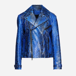 May include: A bright blue motorcycle jacket featuring a black snakeskin pattern throughout. The jacket includes a wide notched collar, an asymmetrical front zipper closure, two zippered side pockets, and adjustable buckled straps at the cuffs.