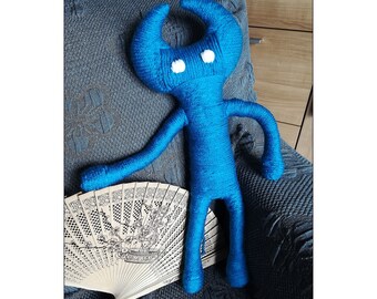 Unravel Yarny 2 Blue: Collectible Geek Plush inspired by the Unravel video game. Unique gift for gamers, customizable colors!