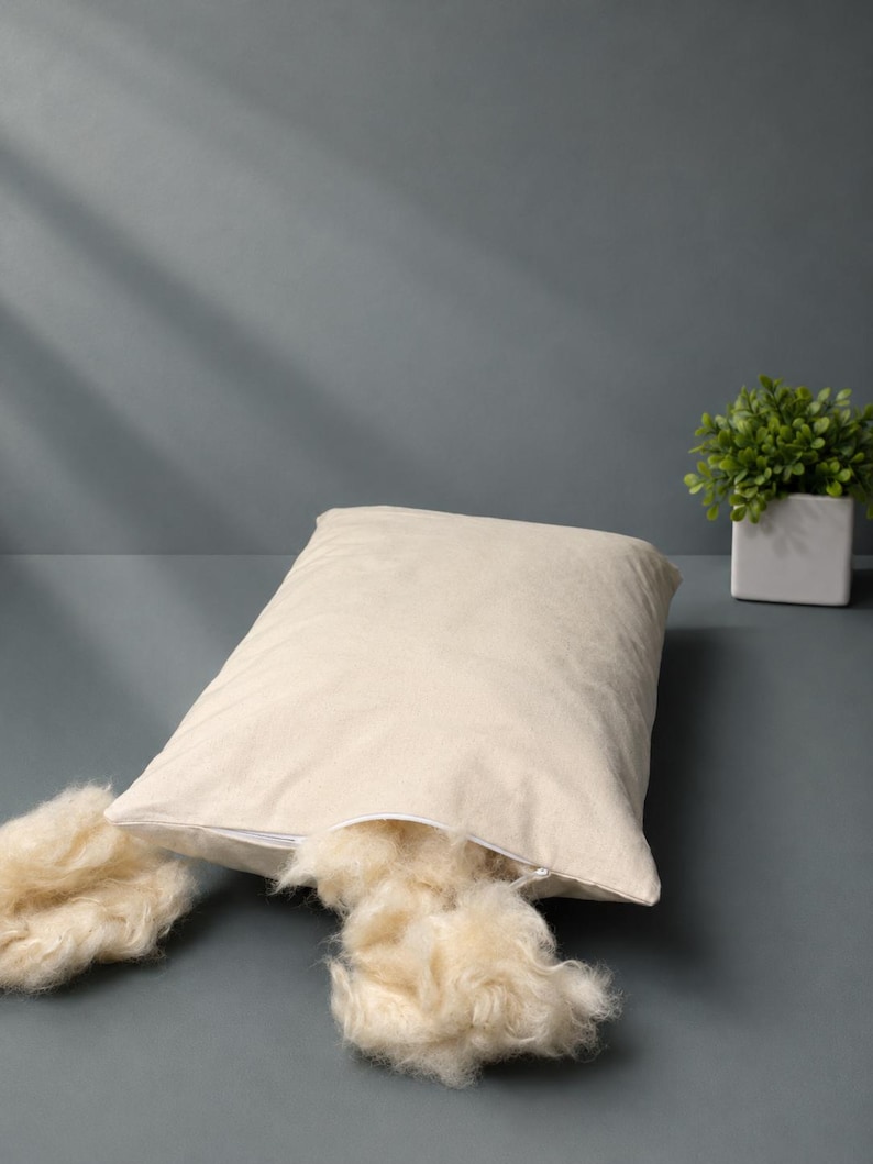 Kapok Pillow . Kapok coming out of pillow from zipper.