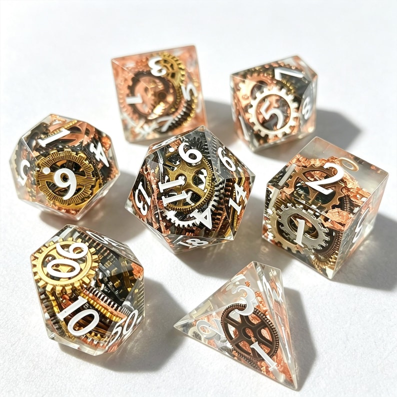 May include: Set of seven polyhedral dice with a steampunk theme. Each die is clear with embedded bronze and silver gears, cogs, and metallic accents. White numbers are visible on each die. The dice are designed for tabletop role-playing games.