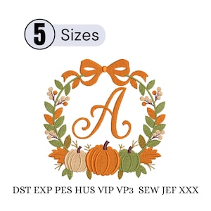 May include: An embroidery design featuring a central cursive letter A surrounded by a wreath of green leaves, orange leaves, and small berries. At the bottom are three pumpkins in beige, orange, and green. Text includes 5 Sizes and file formats.