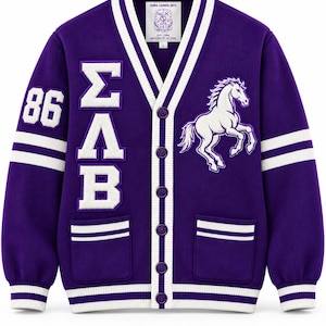 May include: A purple varsity cardigan with white trim, featuring the Greek letters Sigma Lambda Beta in white on the right side, the number 86 on the right sleeve, and a white horse emblem on the left side. It has a button-up front and two pockets.