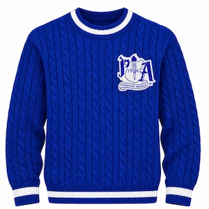 May include: A royal blue cable knit sweater featuring a white striped crew neckline and cuffs. On the left chest is a white patch with the text PA, 1962, and PERSHING ANGELS, featuring a torch graphic centered within a shield-like emblem.