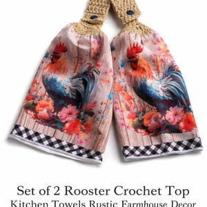 May include: Set of two kitchen towels with a rooster design. The towels feature a colorful rooster illustration on a wood-grain background, accented with floral elements. The tops are crocheted, and the bottom has a black and white checkered pattern.