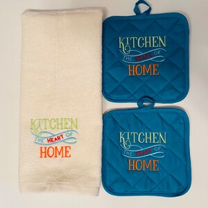 Kitchen towel with matching pot holder