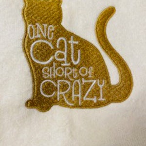 One cat short of crazy hand towel