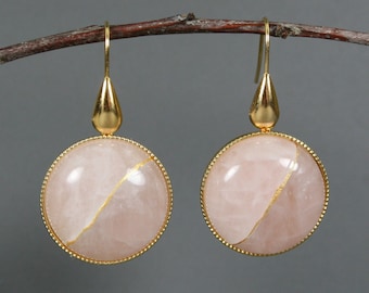 Kintsugi repaired rose quartz earrings in gold plated settings with teardrop ear wires