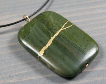 African green jasper pendant with kintsugi repair on black cotton cord