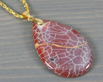 Kintsugi repaired red dragon veins agate teardrop pendant on a chain necklace