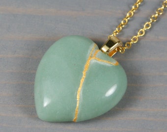 Broken heart pendant in green aventurine with kintsugi repair on a cable chain necklace