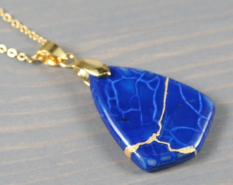 Kintsugi repaired blue dragon veins agate pendant on a cable chain necklace