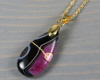 Kintsugi repaired pink druzy and black banded agate teardrop pendant on a cable chain necklace