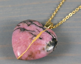 Kintsugi repaired rhodonite broken heart pendant on a chain necklace