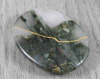 Kintsugi repaired African bloodstone worry stone