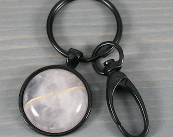 Kintsugi repaired rose quartz stone key chain with black key ring and swivel lobster claw