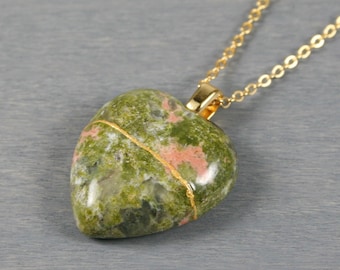 Broken heart pendant in unakite with kintsugi repair on a cable chain necklace