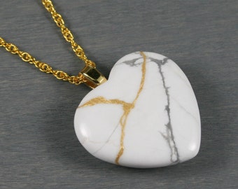 Kintsugi repaired large white howlite broken heart pendant on a rope chain necklace