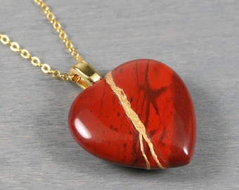 Kintsugi repaired red jasper broken heart pendant on a chain necklace