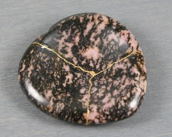 Kintsugi repaired rhodonite heart worry stone