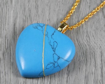 Kintsugi repaired turquoise howlite broken heart pendant on a rope chain necklace