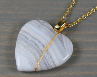 Large broken heart pendant in blue lace agate with kintsugi repair on cable chain