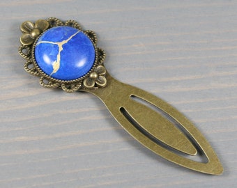 Kintsugi repaired lapis howlite on an antiqued brass bookmark