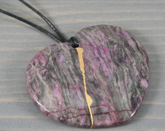Kintsugi repaired lavender crazy lace agate broken heart pendant on black cotton cord