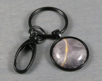 Kintsugi repaired rose quartz stone key chain with black key ring and swivel lobster claw