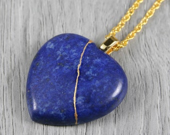 Kintsugi repaired lapis lazuli broken heart pendant on a rope chain necklace