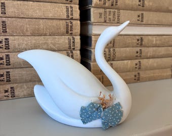 Vintage ceramic swan made in Taiwan with 1980s bow