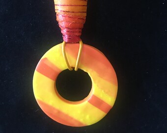 Orange and yellow, polymer clay pendant, leather cord, necklace and eyeglass holder, casual, bright colors, very lightweight,