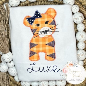 Tiger mascot appliqué, orange and navy, football  girls ruffle shirt, ruffle bubble