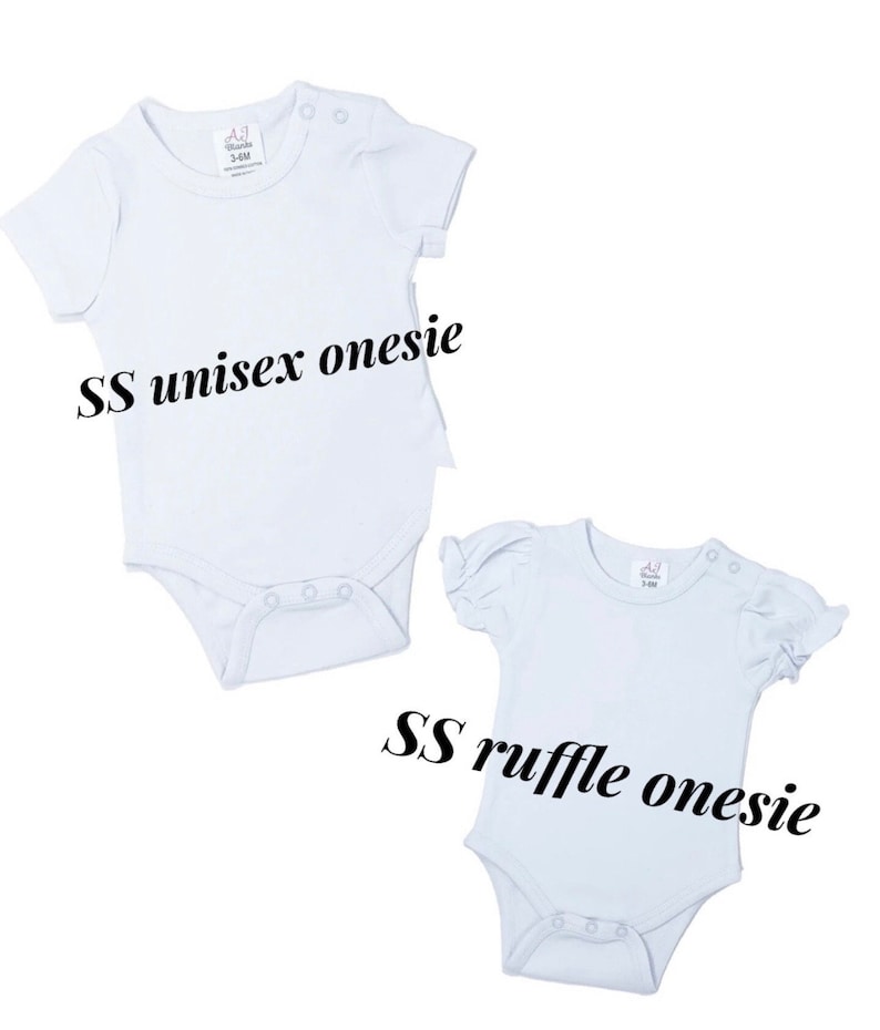 May include: Two white baby onesies, one with short sleeves and the other with short ruffle sleeves. The onesies are labeled "SS unisex onesie" and "SS ruffle onesie".