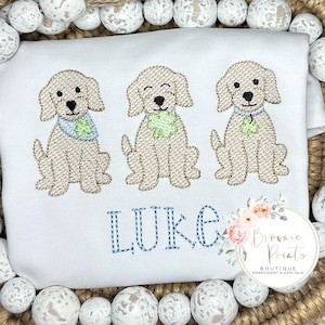 St. Patrick’s Day puppy trio with shamrocks, romper, bubble