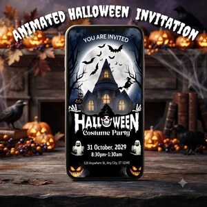 May include: A smartphone screen displaying a Halloween costume party invitation with a haunted house, full moon, bats, and a skull graphic. Text includes YOU ARE INVITED, HALLOWEEN Costume Party, 31 October, 2029, 8:30pm-1:30am, and 123 Anywhere St., Any City, ST 12345.