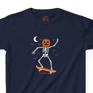 Kids Halloween Skater Skeleton Shirt: Pumpkin Head Graphic Tee