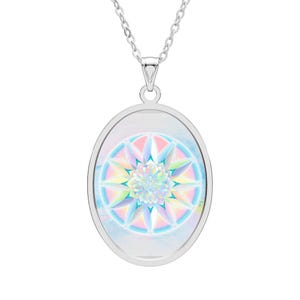 May include: A silver-toned oval pendant necklace featuring a central graphic of a multi-layered, pastel-colored flower mandala. The design displays soft gradients of pink, blue, yellow, and white, encased in a polished metal frame with a link chain.