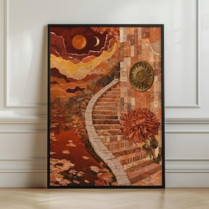 May include: A framed wall art print featuring a collage-style illustration in warm orange, red, and brown tones. The image depicts a stone staircase leading upward, a large sun-like emblem, a crescent moon, and a large textured flower.