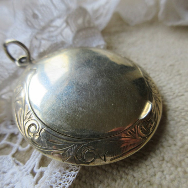 Circa 1920 Sterling Compact Locket , Chased Border W in C Makers Mark